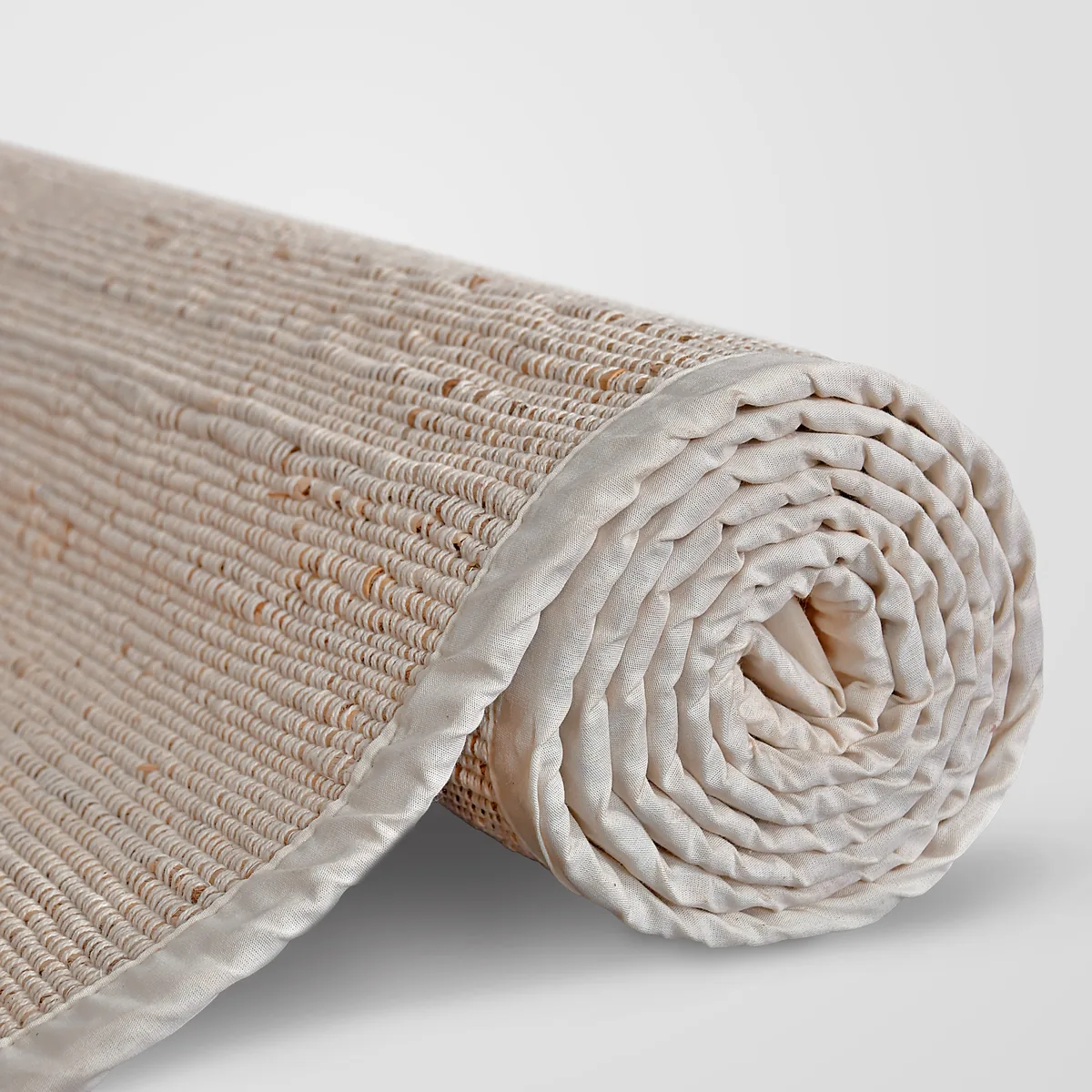 Banana fibre mat partly rolled