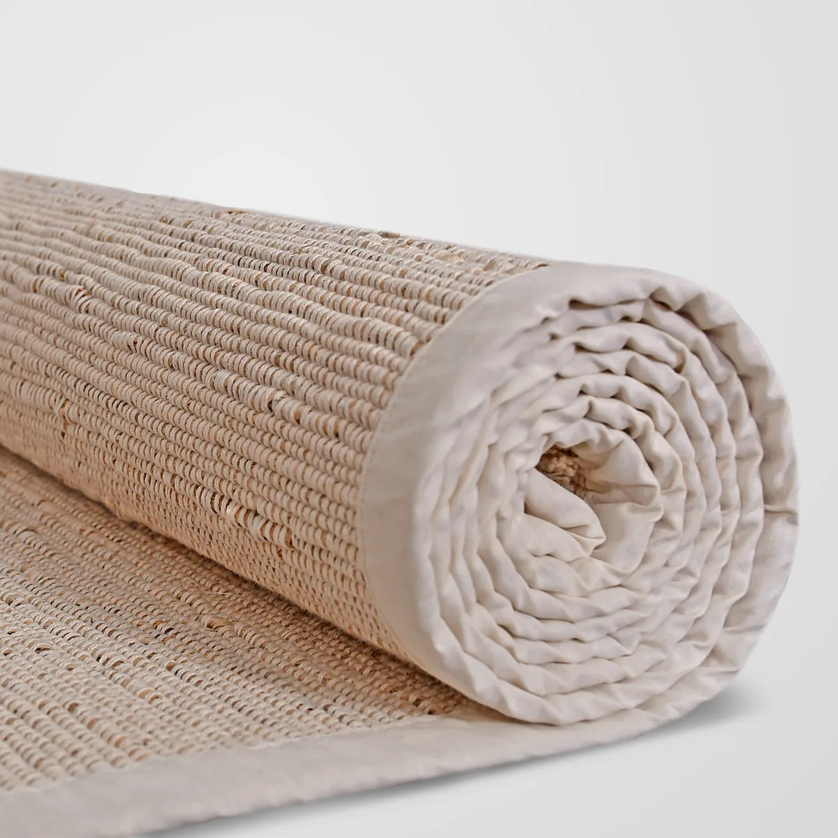 Close-up of the banana fibre weave on the rolled mat