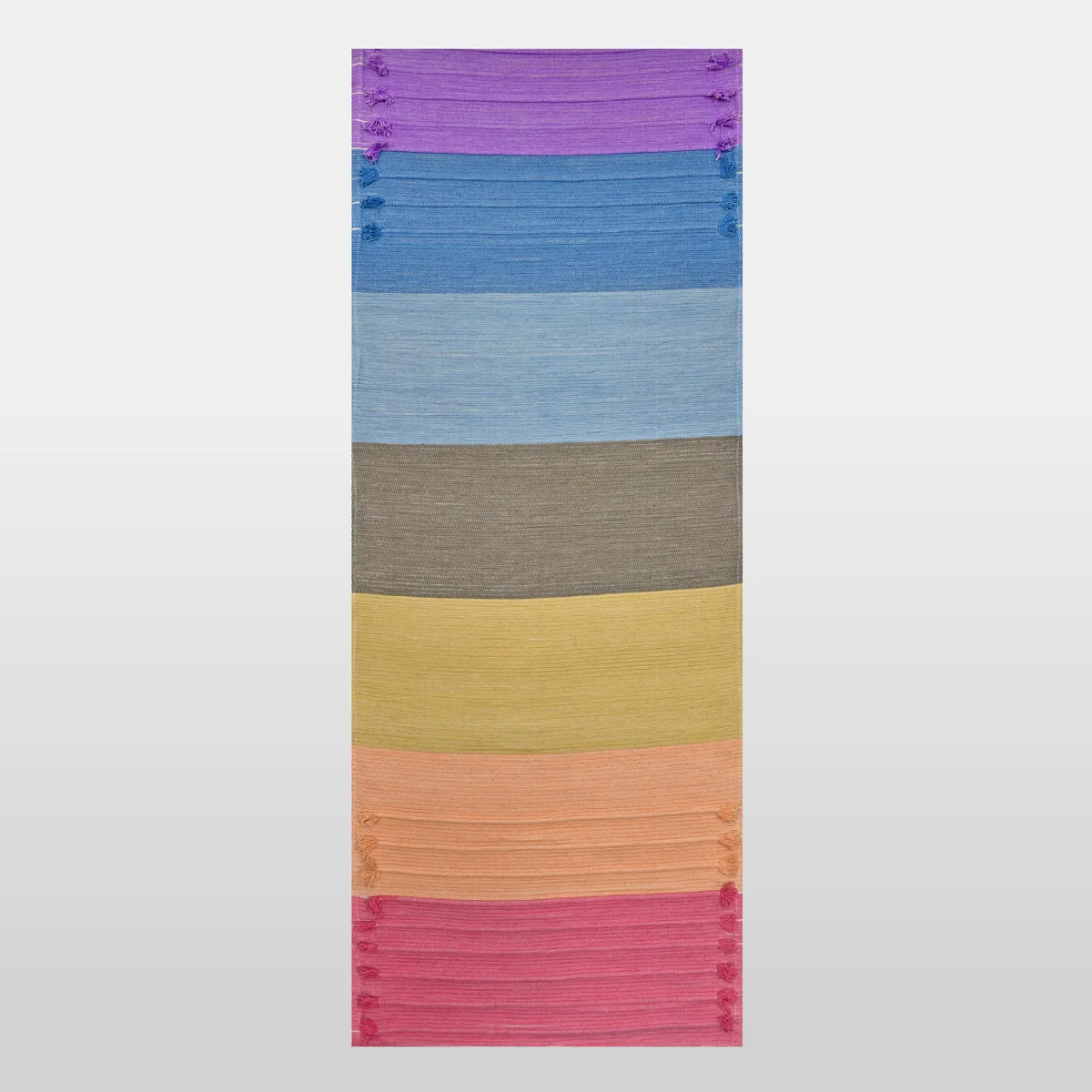Prana Shakti seven-colour chakra mat laid flat
