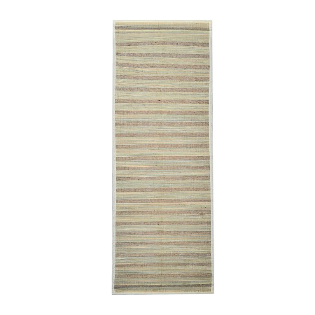 Sambu Jute striped grass mat laid flat, showing fine plant-dyed stripes and cream cotton binding